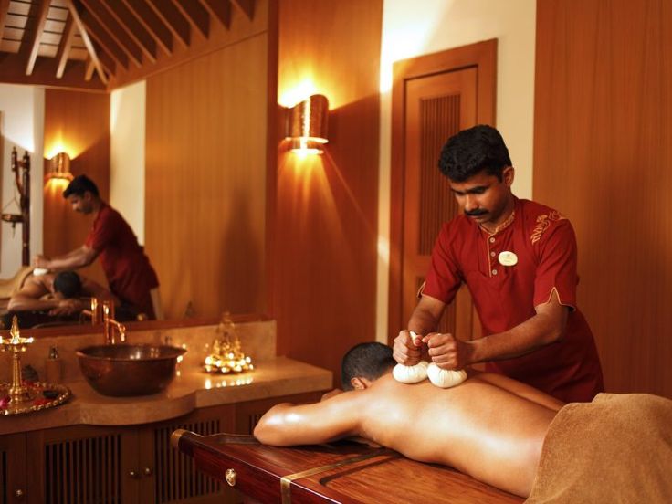 Warm stone therapy during a traditional healing treatment